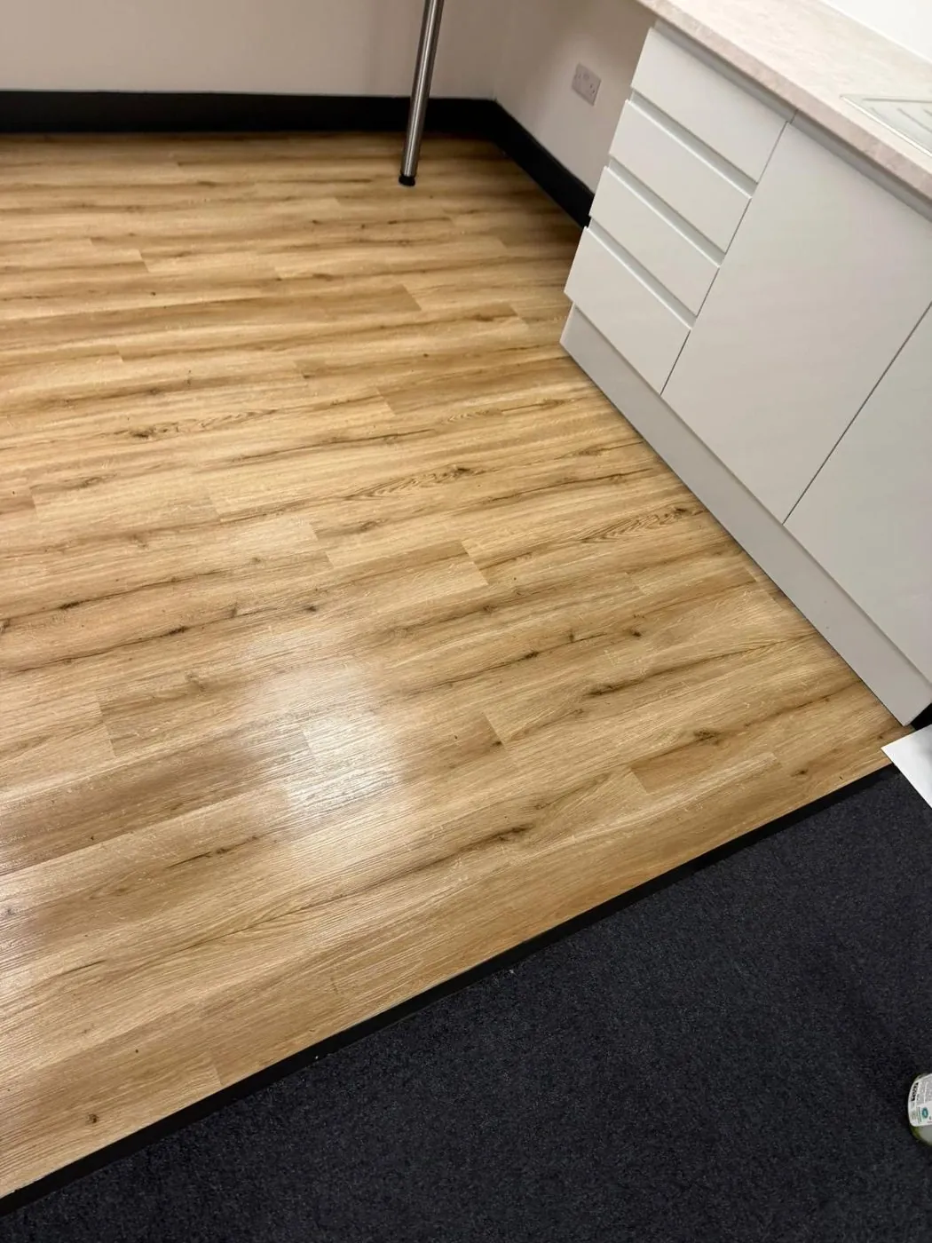 Hard floor cleaned and finished to a completion standard